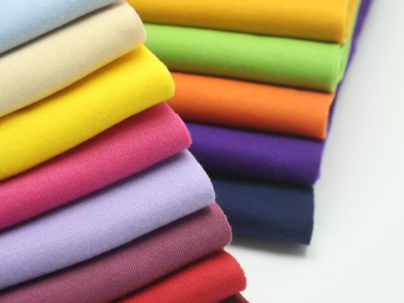 pile of multi colored textiles
